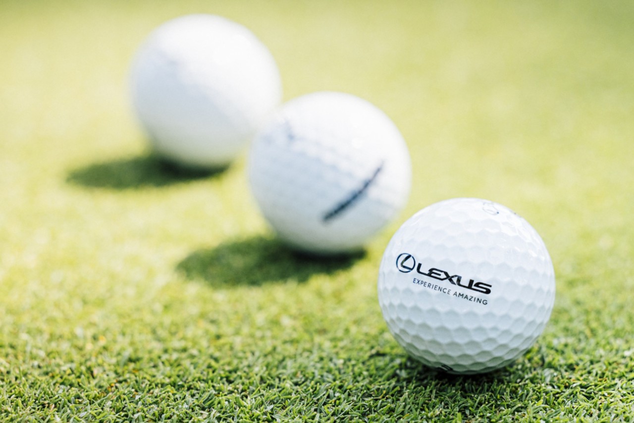 three Lexus Experience Amazing golf balls