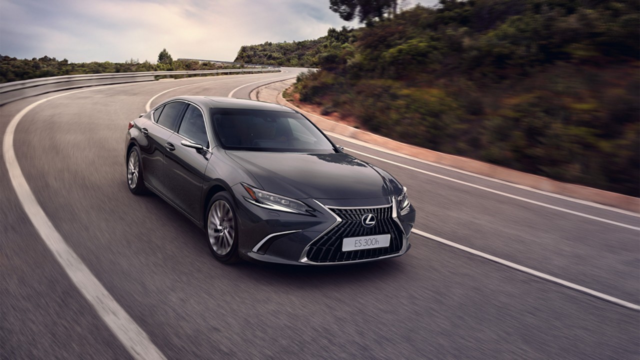 A Lexus ES driving on a road